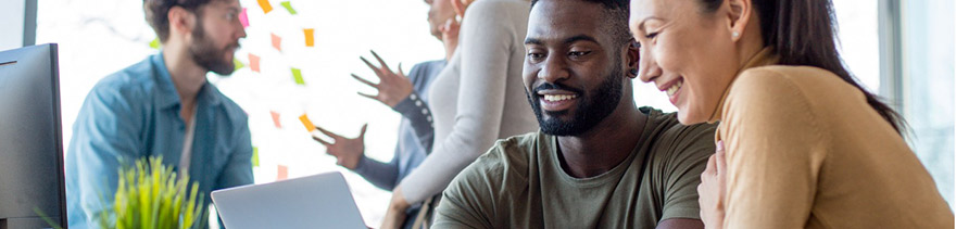 Banner image: Man and woman looking at laptop