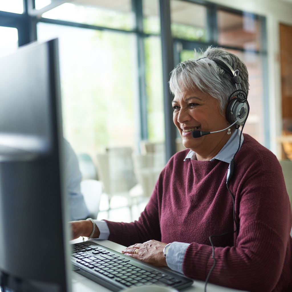 Woman working on a computer in a call centre @istockphoto.com/PeopleImages